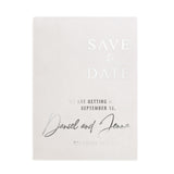 XOXOKristen minimalist Save the Date card printed in silver foil on translucent vellum paper, featuring refined typography for a timeless wedding style – XOXOKristen.