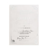 Elegant quinceañera invitation printed in silver foil with ornate corner decorations on frosted vellum paper, combining traditional and modern design elements for a timeless luxurious appearance – XOXOKristen