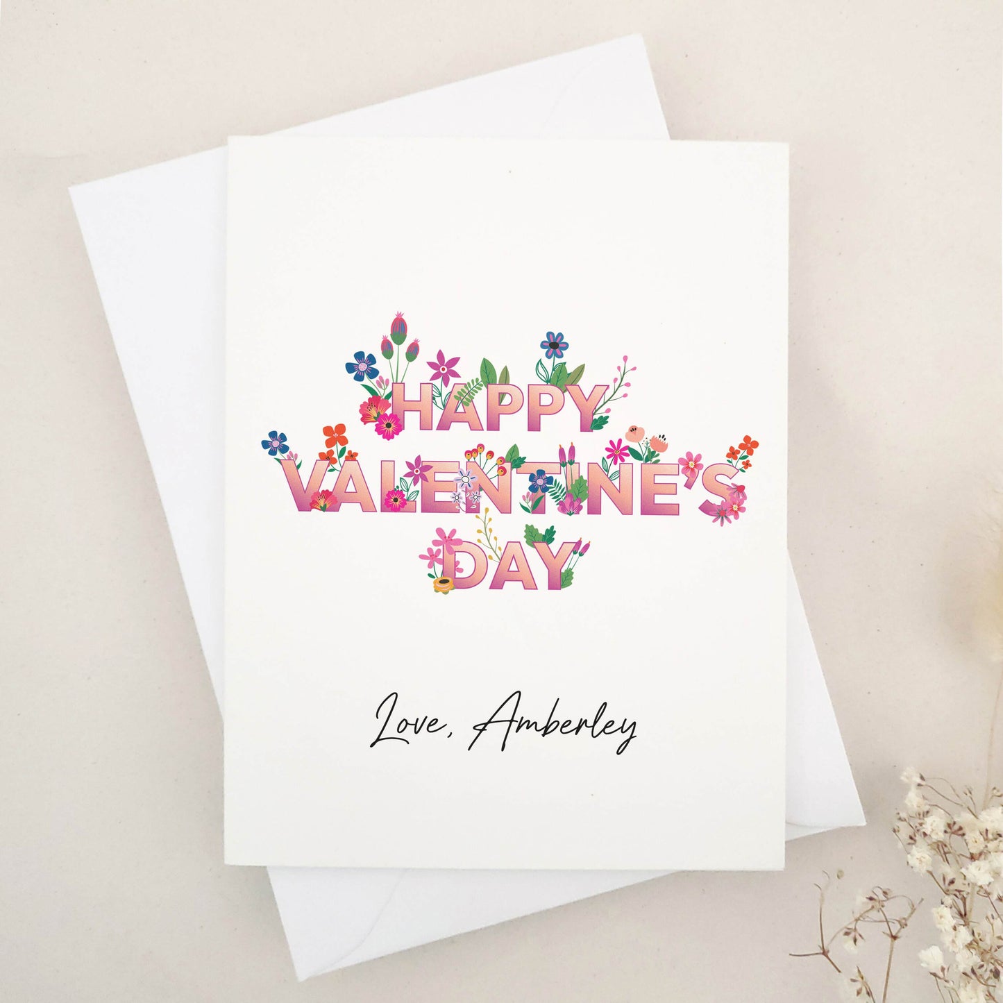 Celebrate Valentine's Day with our stunning Happy Valentine's Day cards, perfect for sharing heartfelt wishes with your best friend, girlfriend, or boyfriend. The design features an elegant blend of floral elements, bold typography, and calligraphy-style signature, symbolizing love and affection.