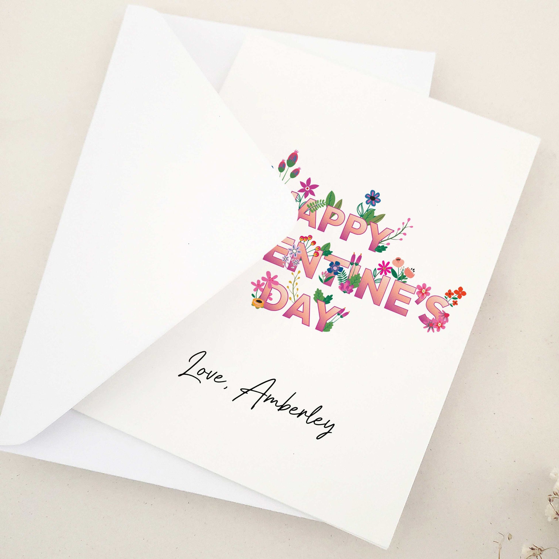 Celebrate Valentine's Day with our stunning Happy Valentine's Day cards, perfect for sharing heartfelt wishes with your best friend, girlfriend, or boyfriend. The design features an elegant blend of floral elements, bold typography, and calligraphy-style signature, symbolizing love and affection.