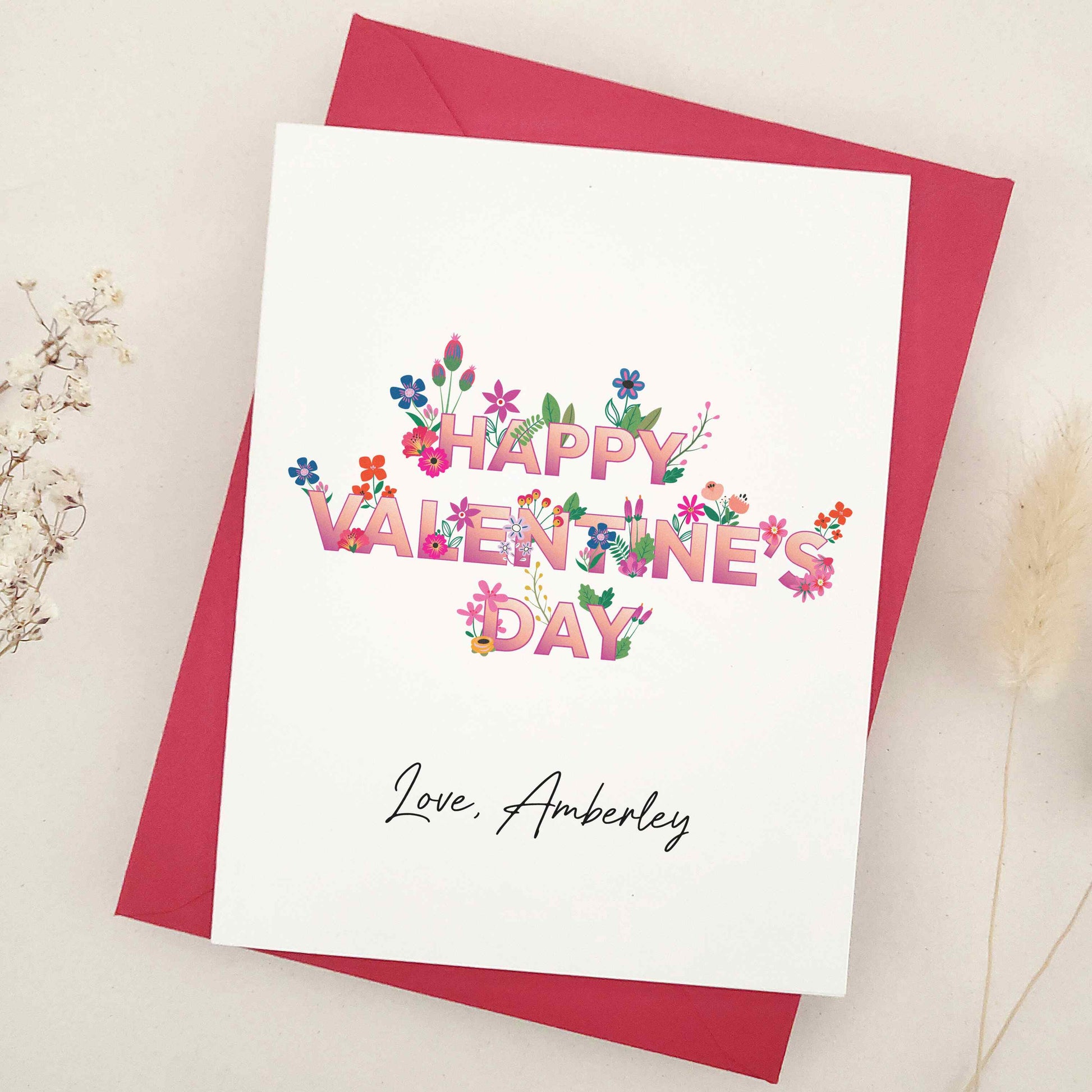 Celebrate Valentine's Day with our stunning Happy Valentine's Day cards, perfect for sharing heartfelt wishes with your best friend, girlfriend, or boyfriend. The design features an elegant blend of floral elements, bold typography, and calligraphy-style signature, symbolizing love and affection.