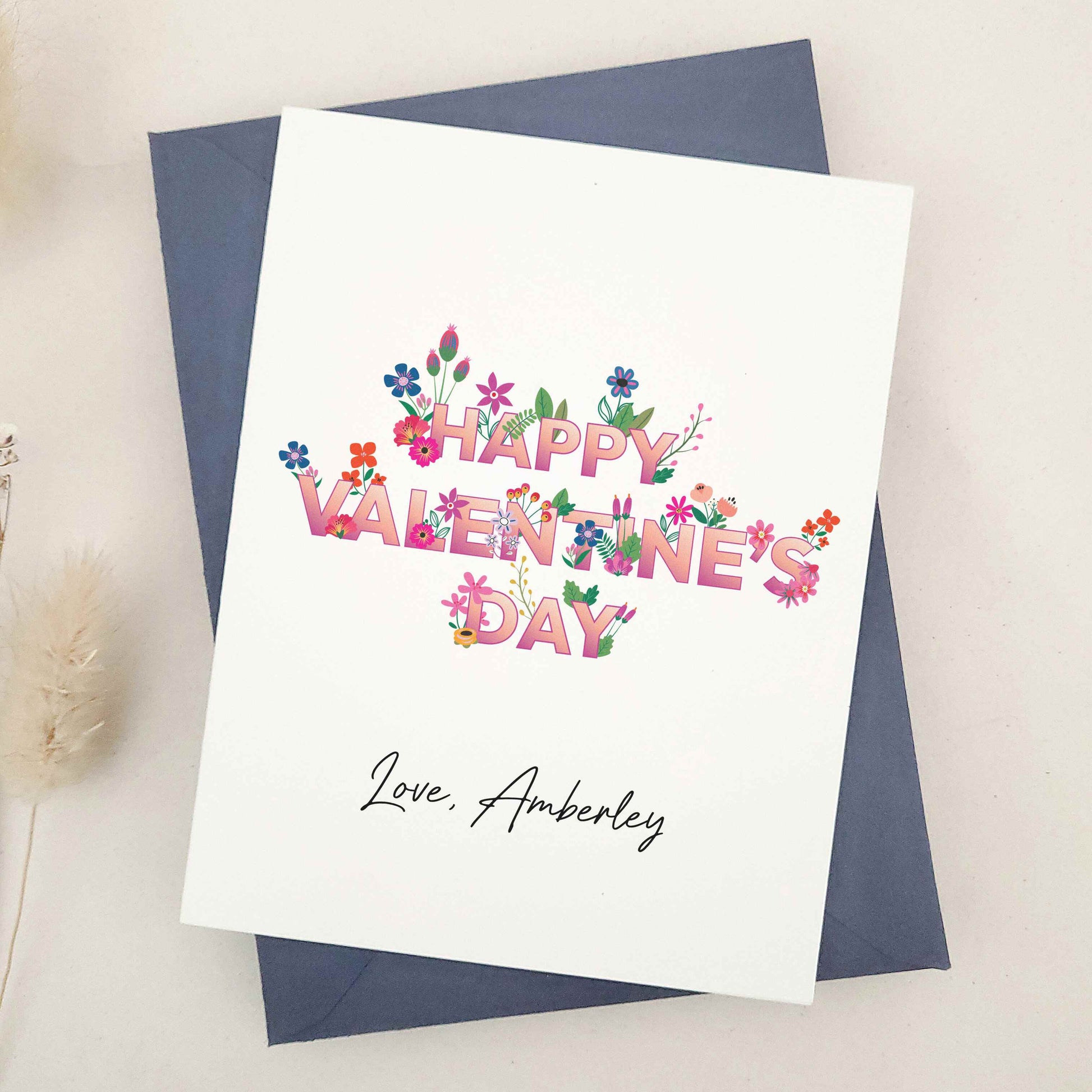 Celebrate Valentine's Day with our stunning Happy Valentine's Day cards, perfect for sharing heartfelt wishes with your best friend, girlfriend, or boyfriend. The design features an elegant blend of floral elements, bold typography, and calligraphy-style signature, symbolizing love and affection.