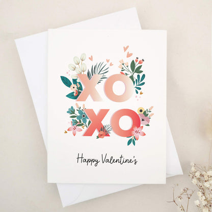 Celebrate Valentine's Day with our gorgeous Happy Valentine's Day cards, a beautiful keepsake for that special someone in your life. The design features a bold combination of flowers and elegant typography, exuding romance and personal flair.