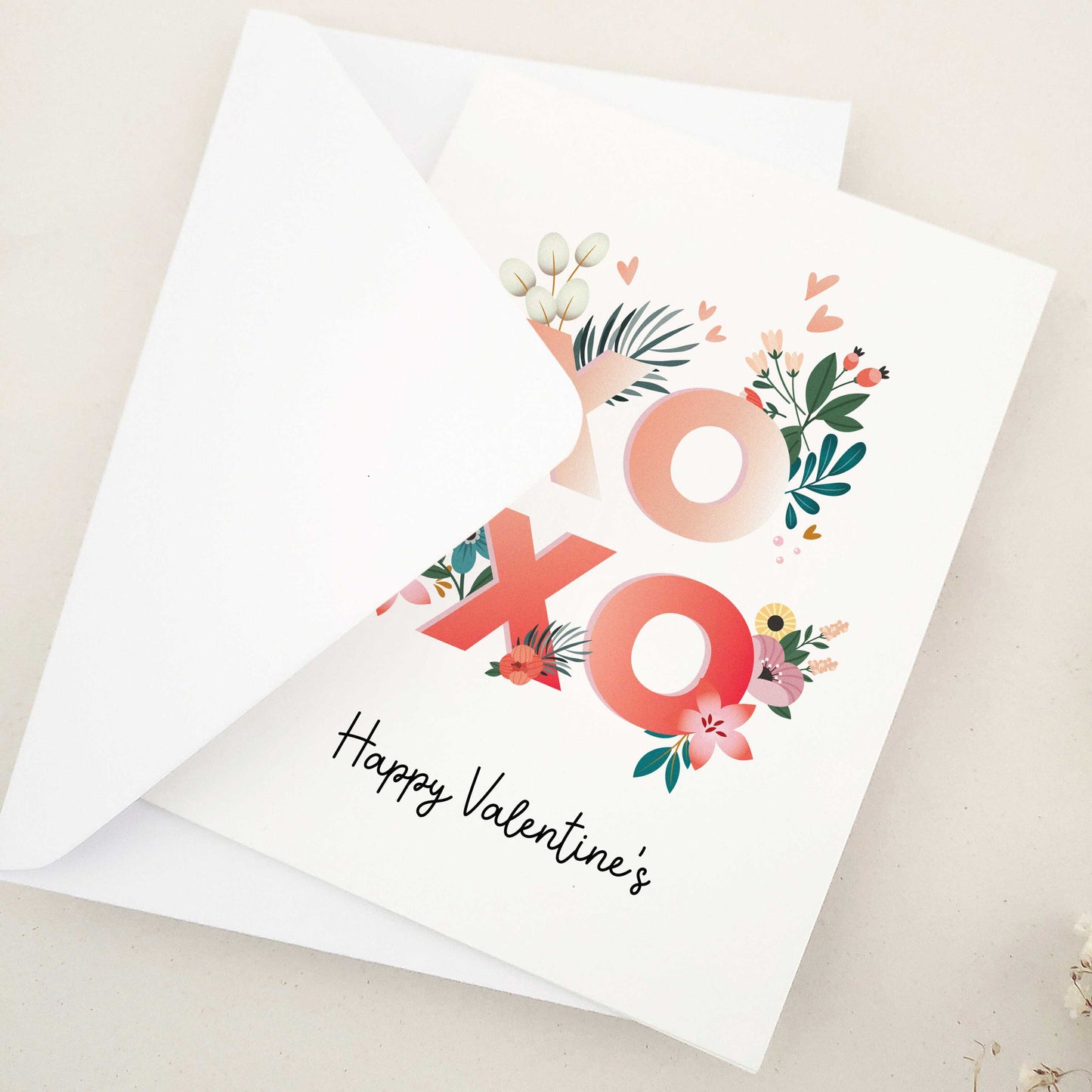 Celebrate Valentine's Day with our gorgeous Happy Valentine's Day cards, a beautiful keepsake for that special someone in your life. The design features a bold combination of flowers and elegant typography, exuding romance and personal flair.