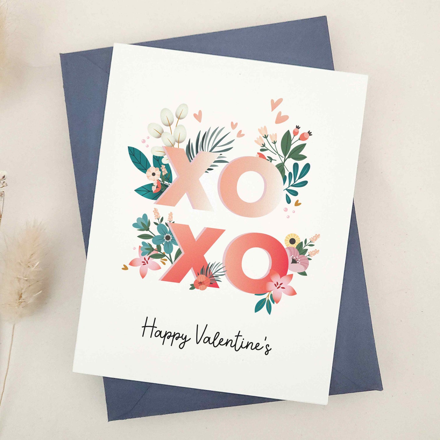 Celebrate Valentine's Day with our gorgeous Happy Valentine's Day cards, a beautiful keepsake for that special someone in your life. The design features a bold combination of flowers and elegant typography, exuding romance and personal flair.