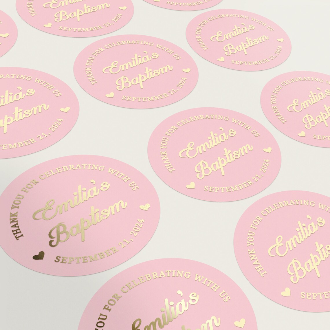 personalized pink and gold baptism stickers with named and date, and text reading Thank you for celebrating with us. 