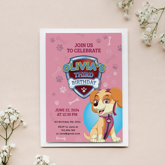 first birthday invitation for a baby girl with pink design featuring little cartoon dog
