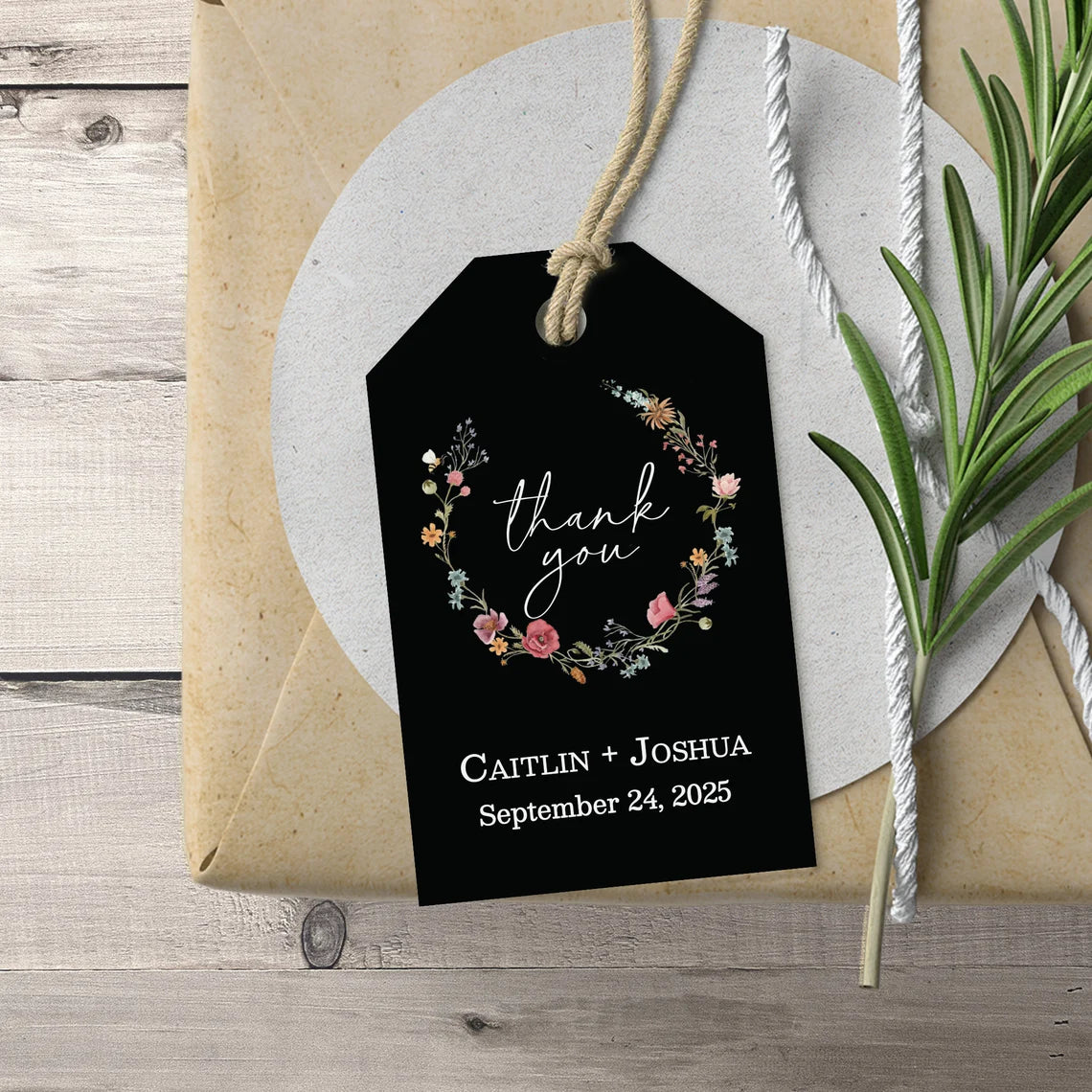 Sophisticated black wedding favor tags with watercolor wildflowers wreath.