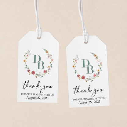 Elegant personalized monogram wedding favor tags with watercolor wildflowers wreath.