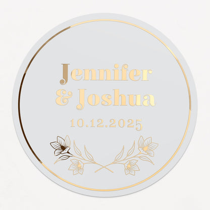 Personalized wedding sticker with bold names, date, and floral branches on clear background