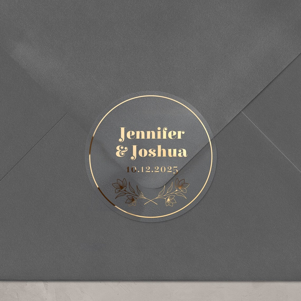 Personalized wedding sticker with bold names, date, and floral branches on clear background