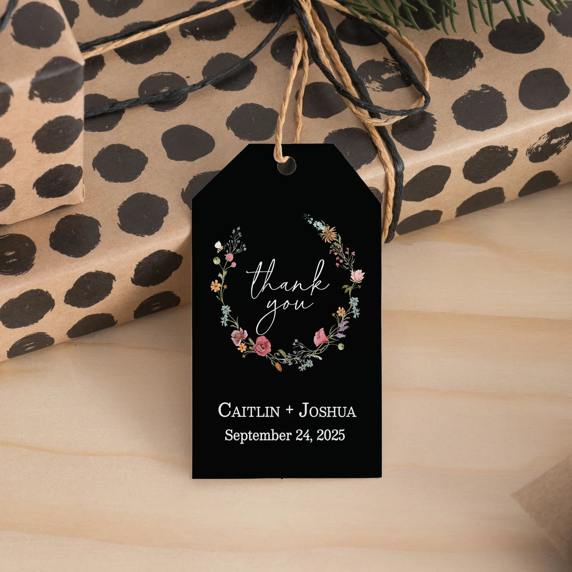 Sophisticated black wedding favor tags with watercolor wildflowers wreath.