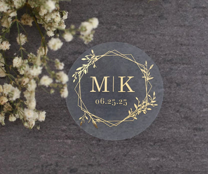 Minimalistic personalized wedding sticker with monograms, date, and floral frame on clear background