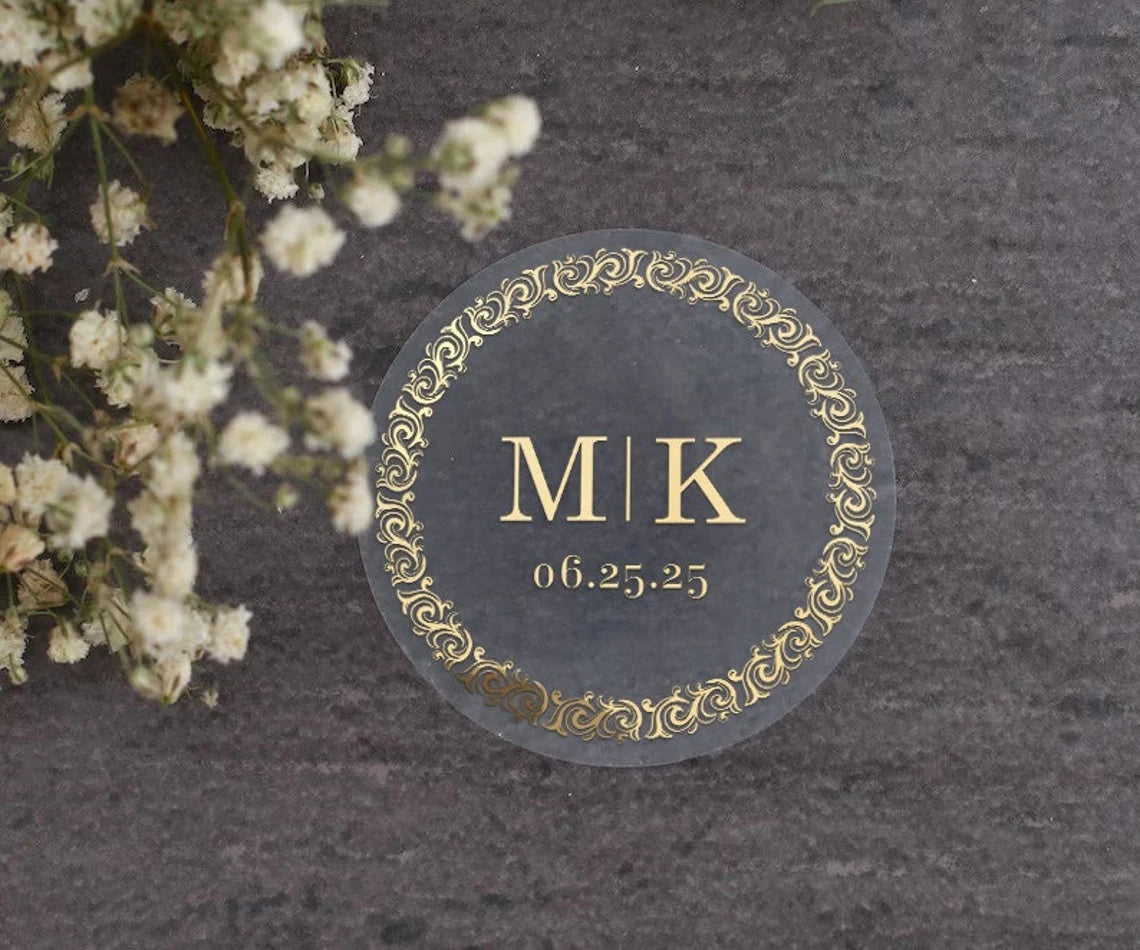Personalized wedding sticker with monograms, date, and black ornate frame on clear background