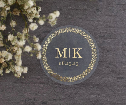 Personalized wedding sticker with monograms, date, and black ornate frame on clear background