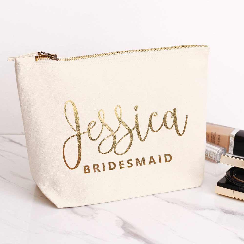 Personalized bridesmaid gift cosmetic pouch with gold foiled handwritten name. Customizable for maid of honor, bridesmaid or other wedding role -  XOXOKristen