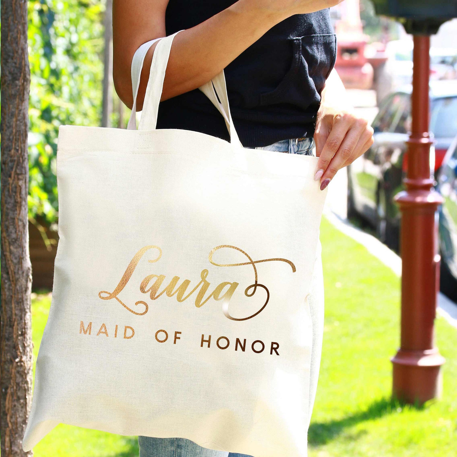 Personalized bridesmaid tote bag with gold foiled lettering. Customize for maid of honor, flower girl, matron of honor or other custom  wedding roles – XOXOKristen