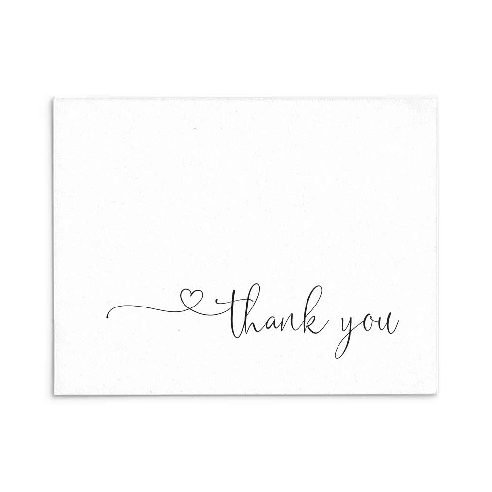 Thank you wedding card with elegant handwritten "Thank you" and delicate heart detail - XOXOKristen