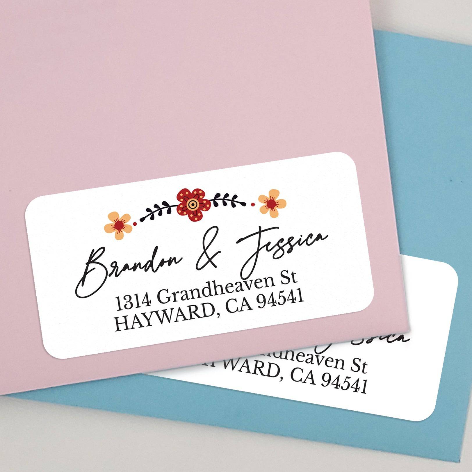 Floral personalized address label on lavender and blue envelopes, featuring elegant calligraphy text — XOXOKristen.