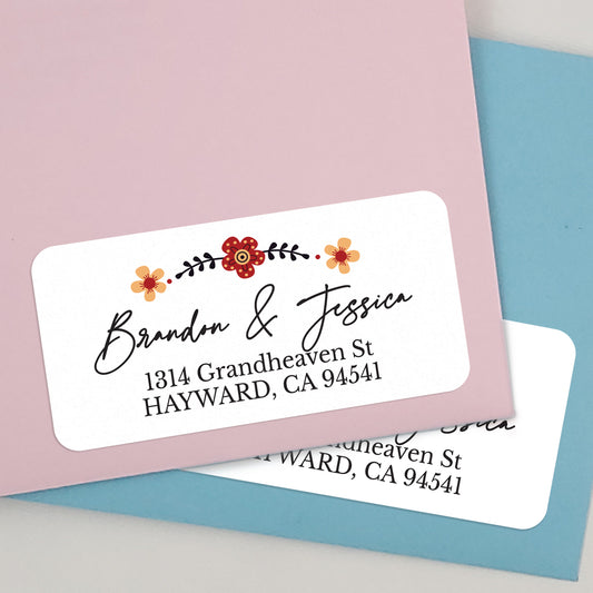 white floral return address labeld with red and orange flower design - XOXOKristen