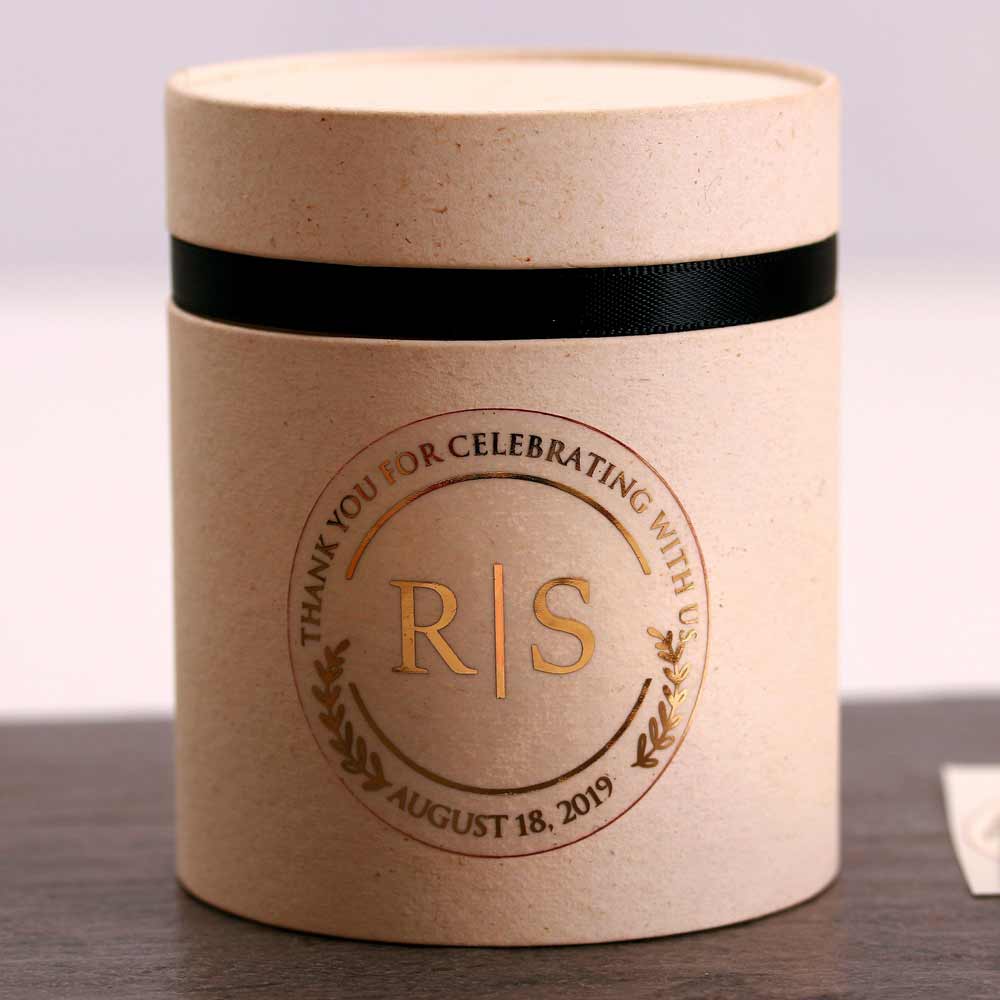 Custom wedding thank you sticker with monogram initials and real gold foiled lettering. Entirely personalized clear labels.
