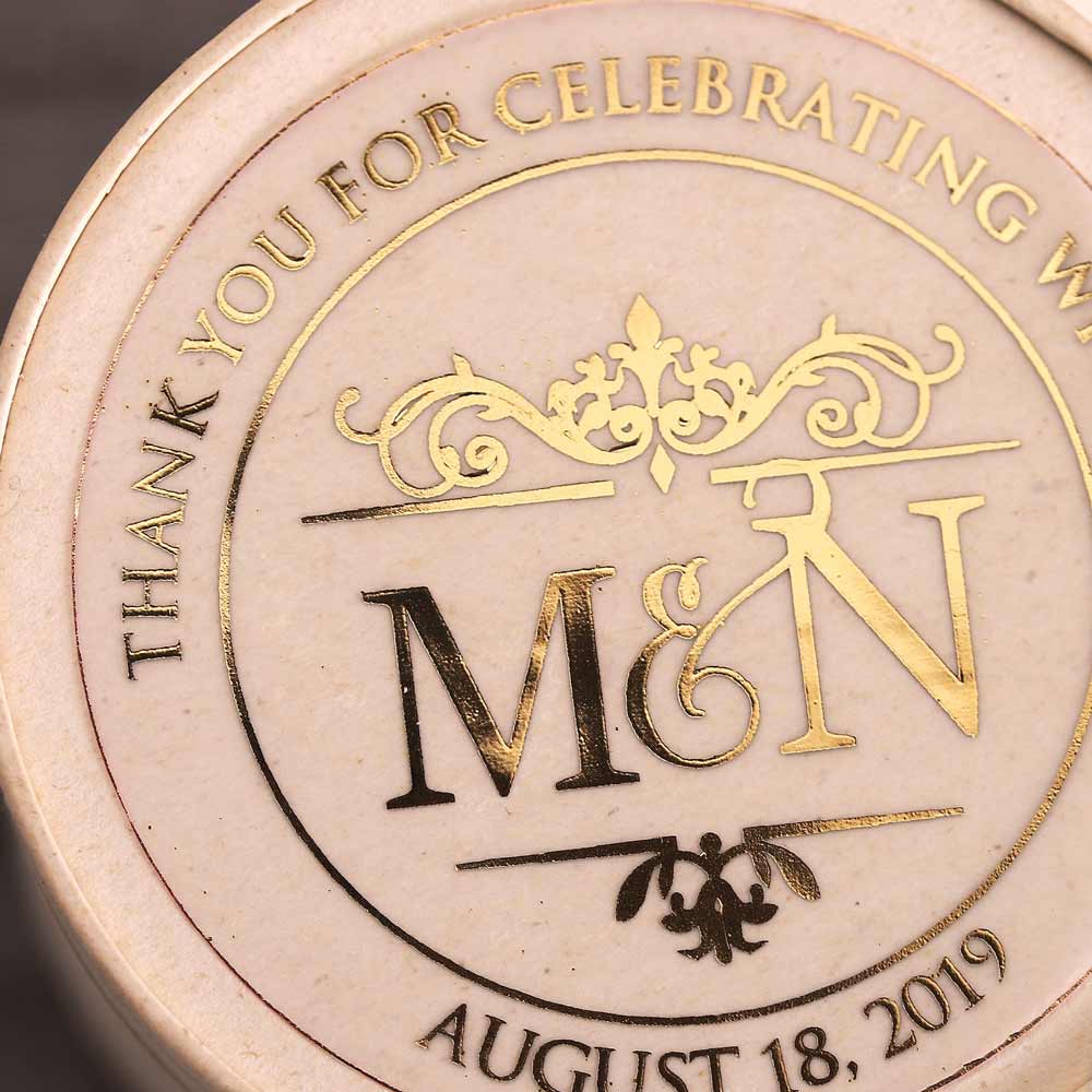 Custom wedding thank you sticker with monogram initials and gold foiled lettering. Entirely personalized clear labels.