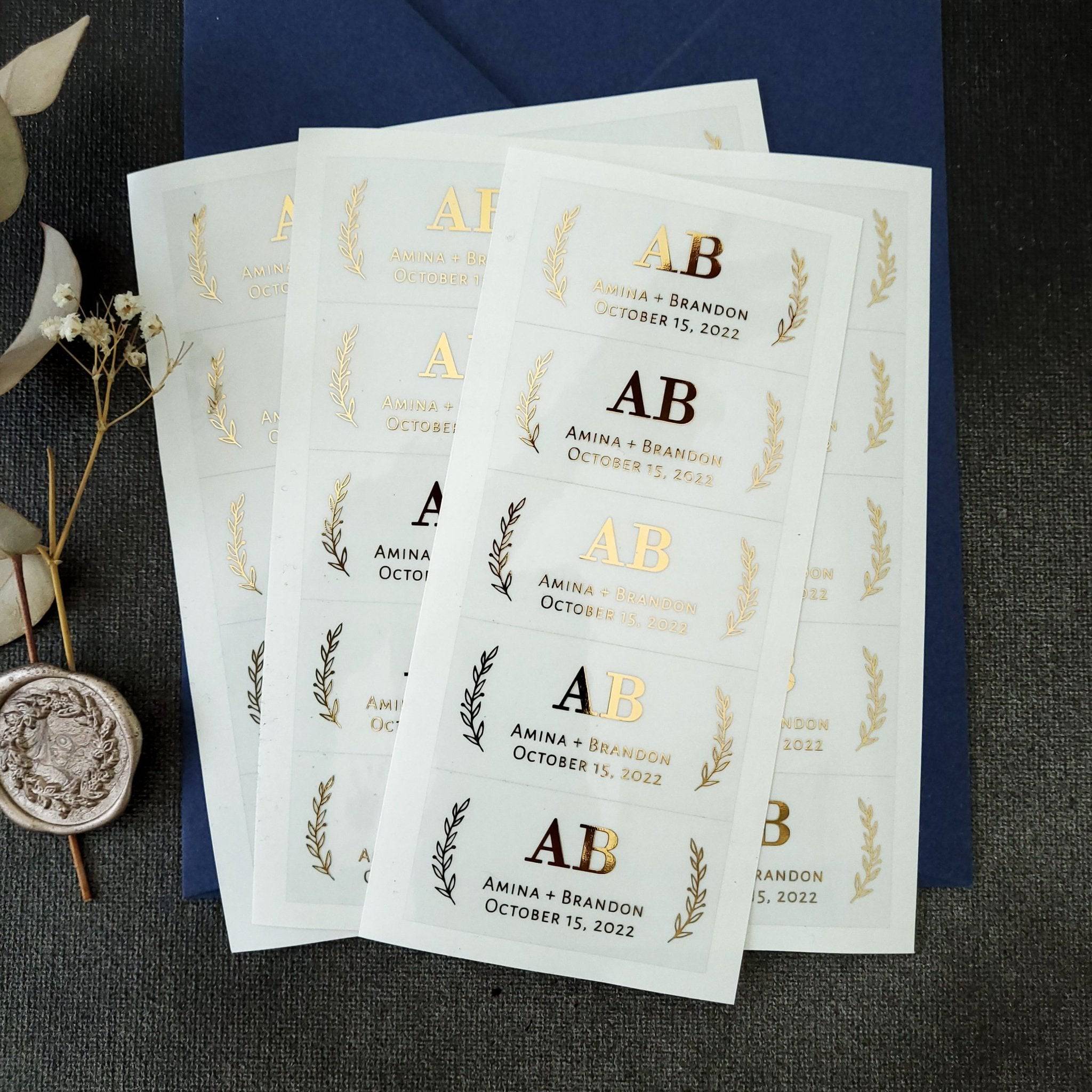 Clear Personalized rectangular gold foiled weddinf favor stickers with initials and leaf ornaments