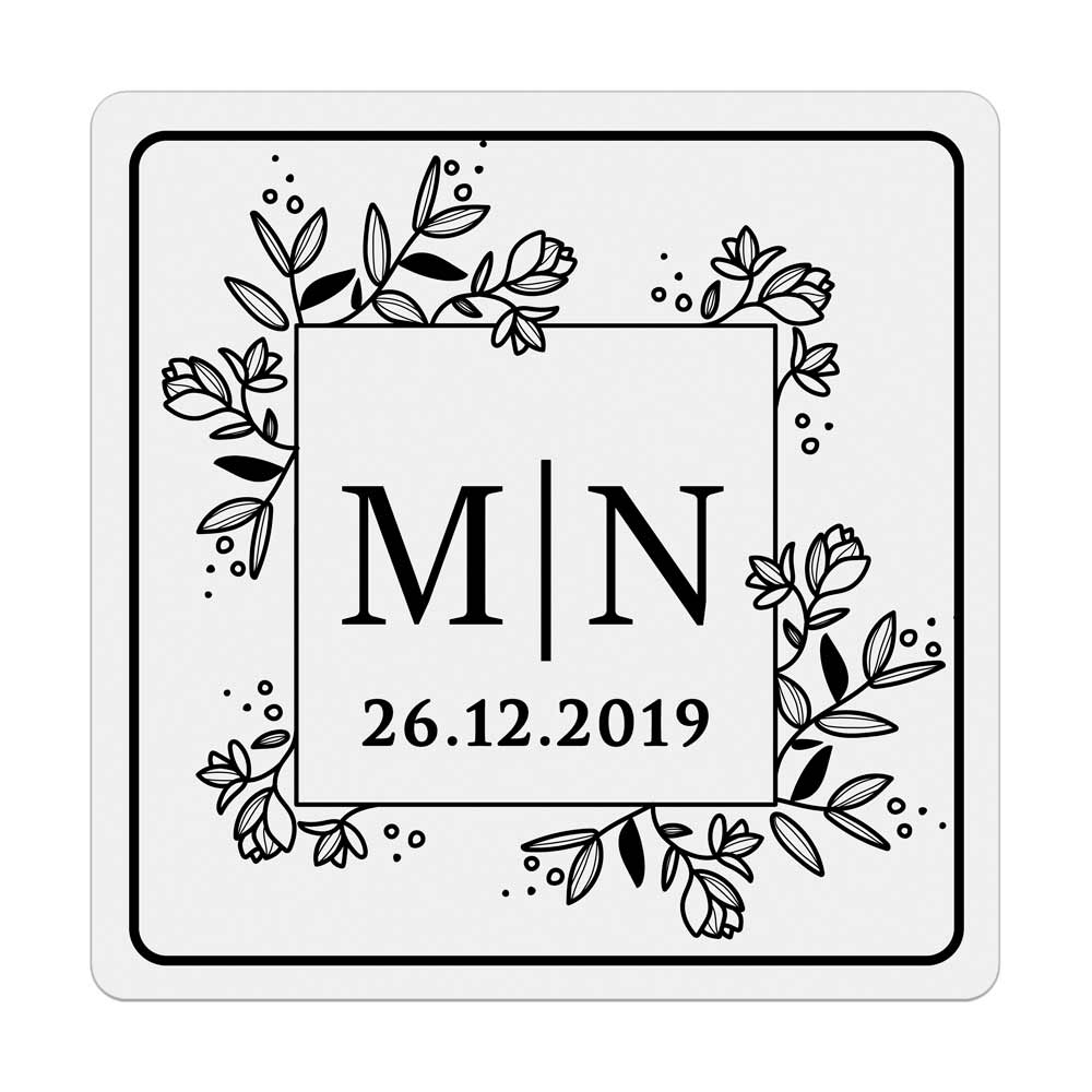 Custom wedding sticker with monogram initials and floral design. Entirely personalized clear labels.