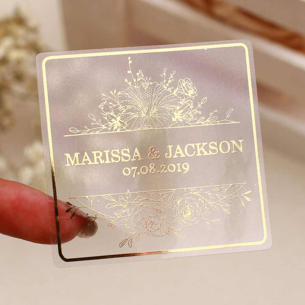 Custom floral wedding sticker with real gold foil lettering. Entirely personalized clear label.