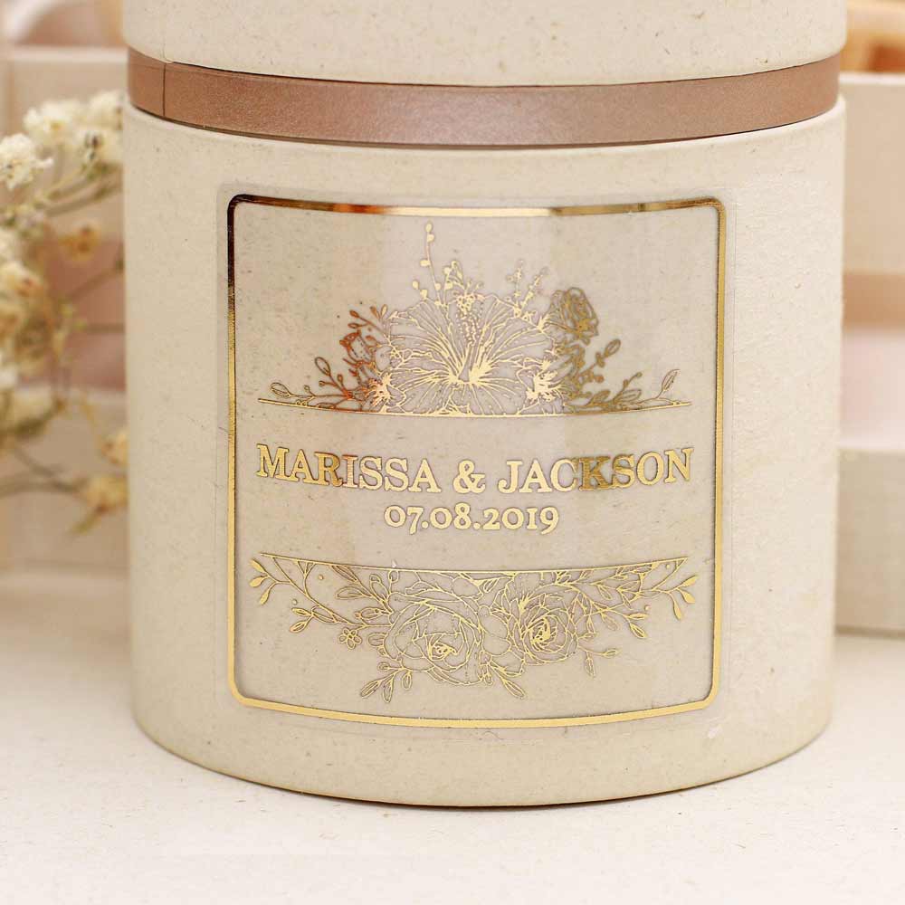 Custom floral wedding sticker with real gold foil lettering. Entirely personalized clear label.
