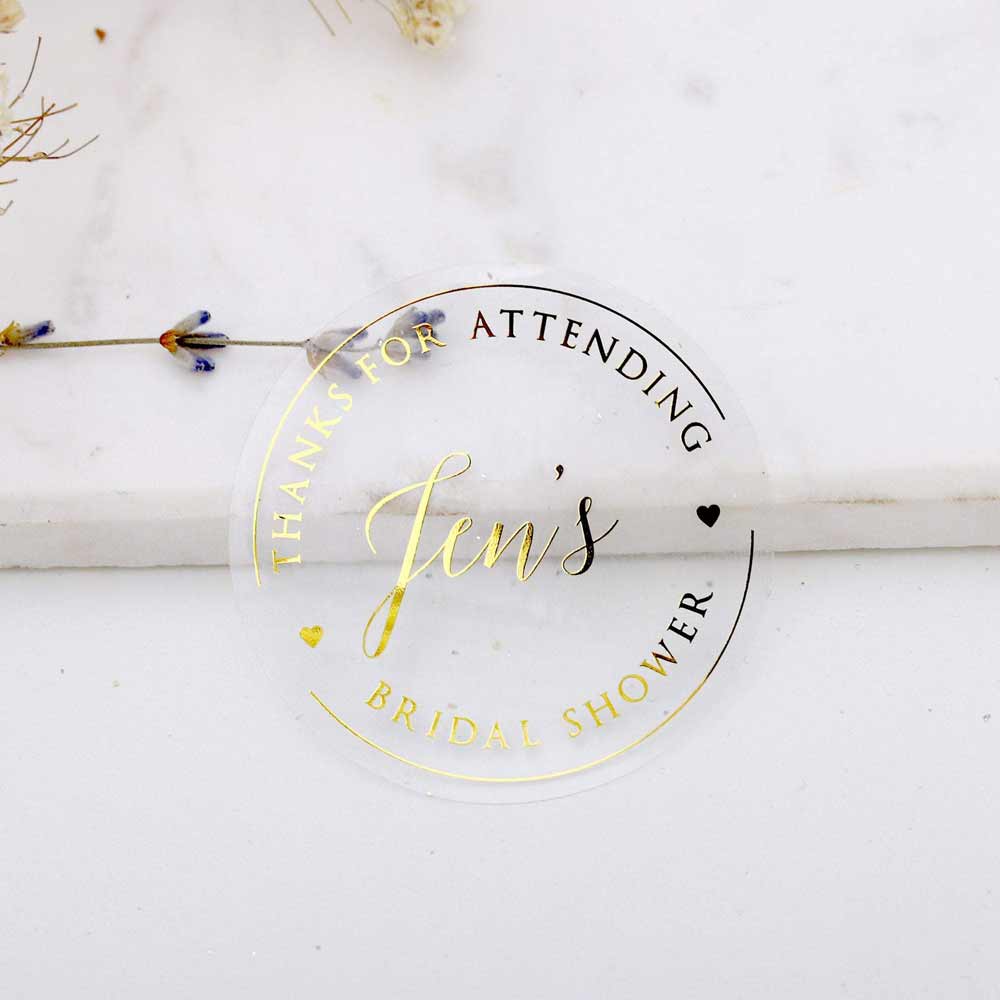 Custom gold foiled bridal shower stickers with hearts and real gold foil lettering. Entirely personalized clear labels.  