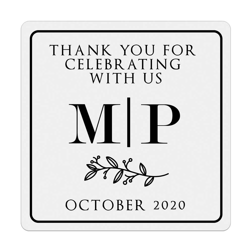 Custom gold foiled wedding stickers with monogram initials and floral design. Entirely personalized clear labels.