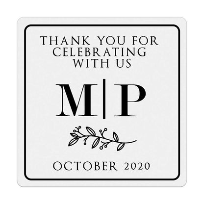 Custom gold foiled wedding stickers with monogram initials and floral design. Entirely personalized clear labels.