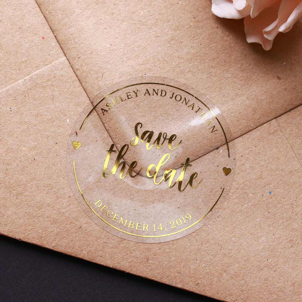 Custom wedding save the date  sticker real gold foiled lettering. Entirely personalized clear labels.