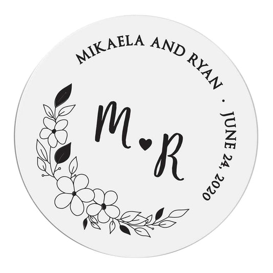 Custom wedding sticker with real gold foiled lettering and flower ornament. Entirely personalized clear labels.