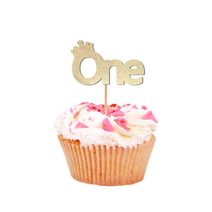 First birthday party decoration with gold glittered cupcake topper - XOXOKristen