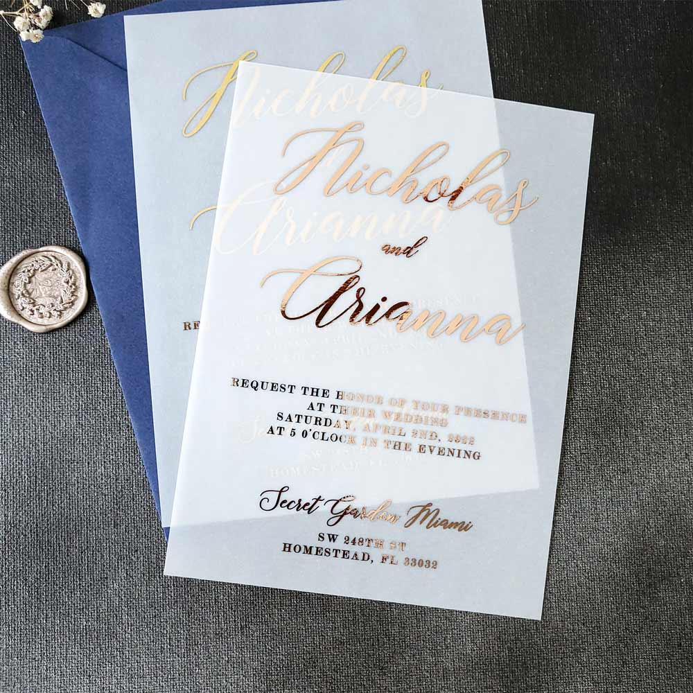 Elegant vellum wedding invitations with gold foiled print - XOXOKristen 