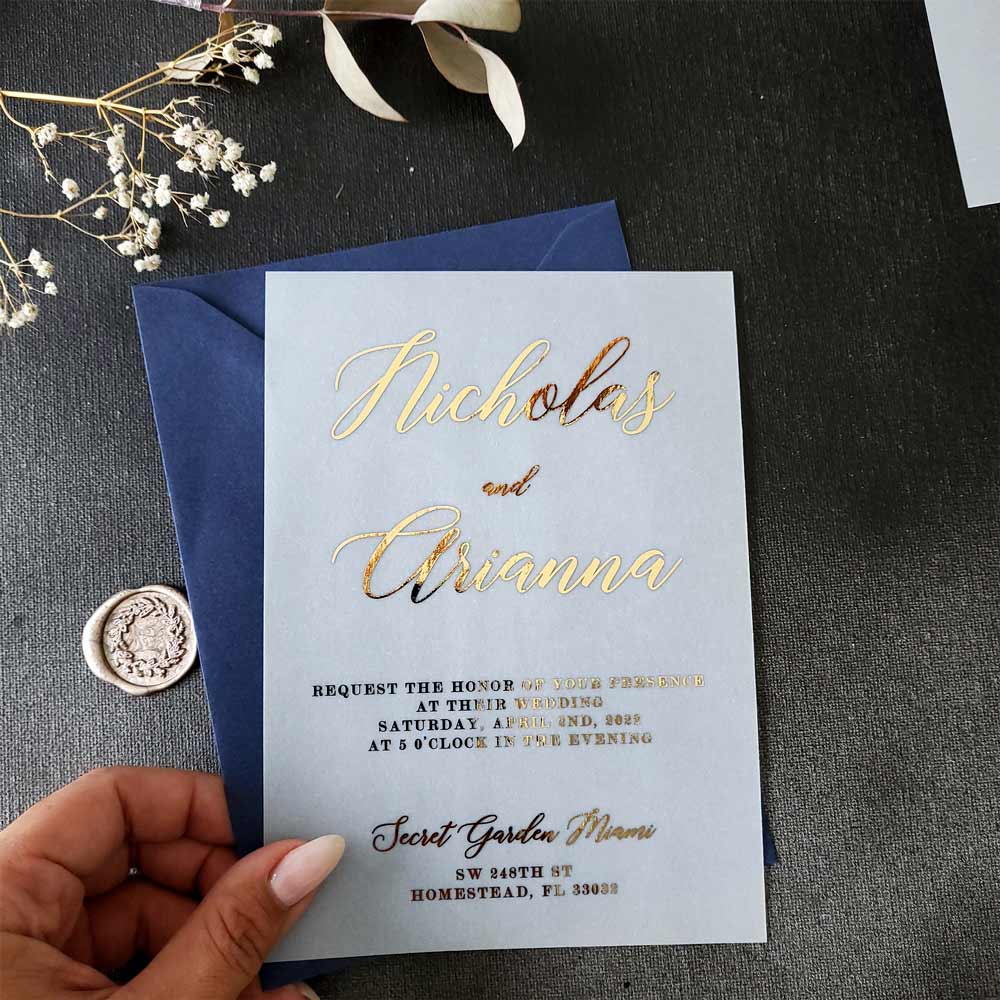 Elegant vellum wedding invitations with gold foiled print - XOXOKristen 