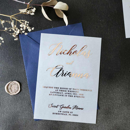 Elegant vellum wedding invitations with gold foiled print - XOXOKristen 