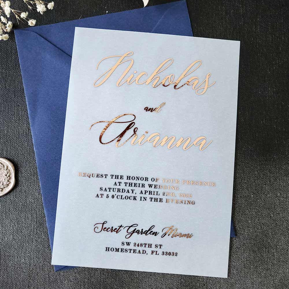 Elegant vellum wedding invitations with gold foiled print - XOXOKristen 