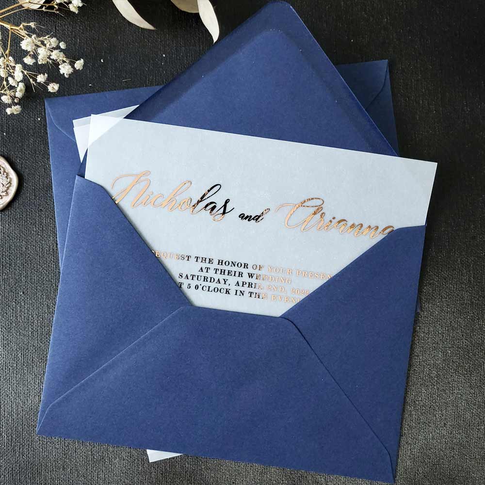 Elegant vellum wedding invitations with gold foiled print - XOXOKristen 