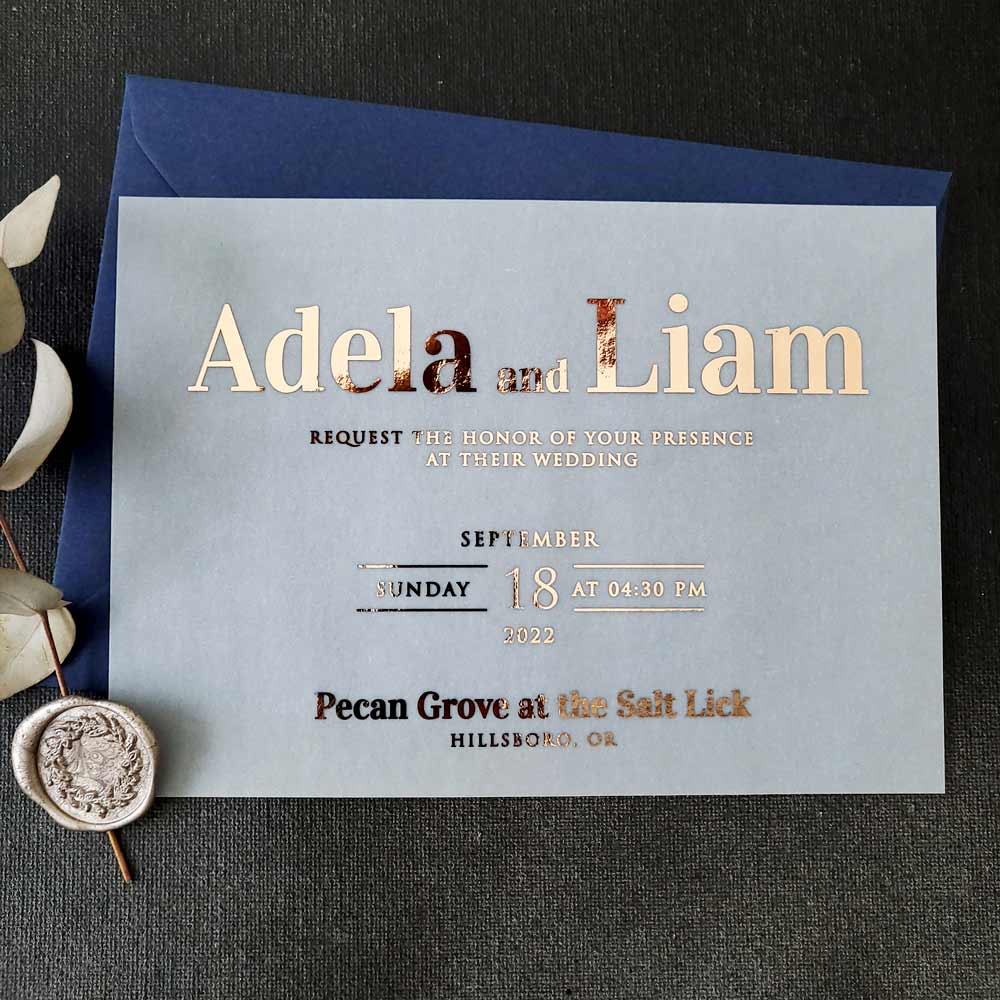 Elegant vellum wedding invitations with gold foiled writing - XOXOKristen 