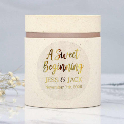 Custom wedding sweet beginnings sticker with real gold foiled lettering. Entirely personalized clear labels.  