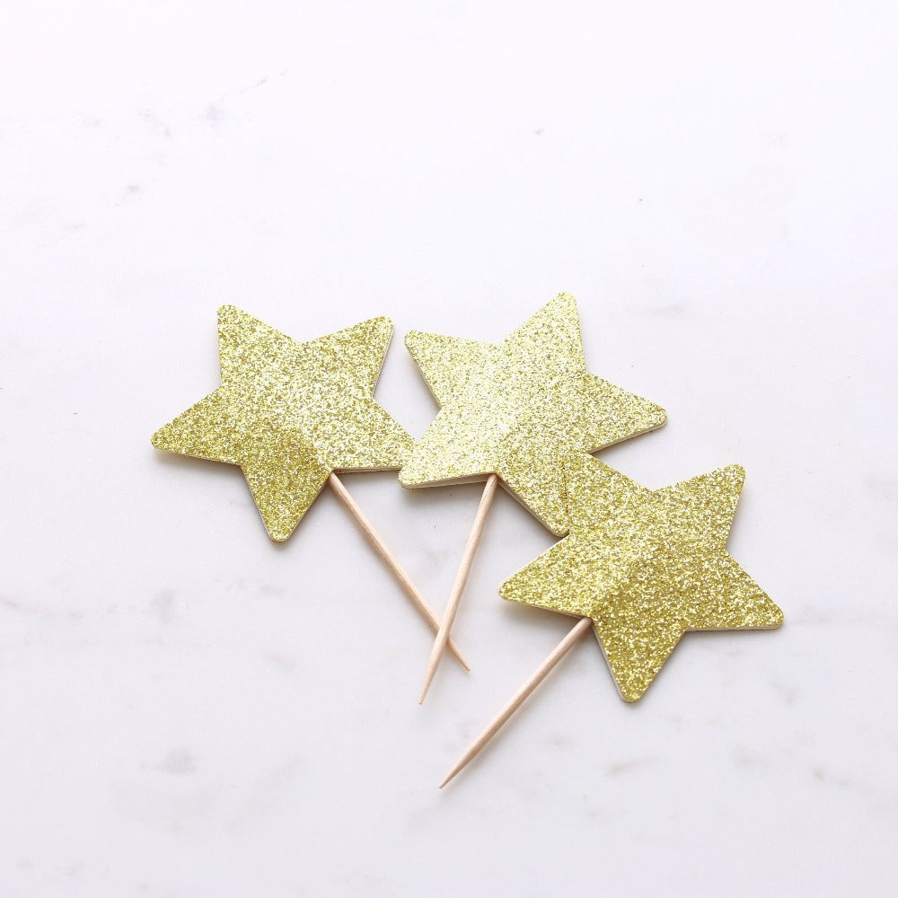 Gold glittered star-shaped cupcake topper for unique party decoration - XOXOKristen