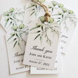 XOXOKristen Eucalyptus Branch Thank You Tags printed with watercolor eucalyptus leaves and delicate greenery, featuring the static “Thank you” text in elegant black script on matte white cardstock.